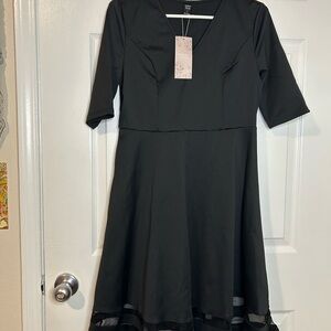 NWT Elegant Black Midi Dress with Sheer Hem. Crosslisted